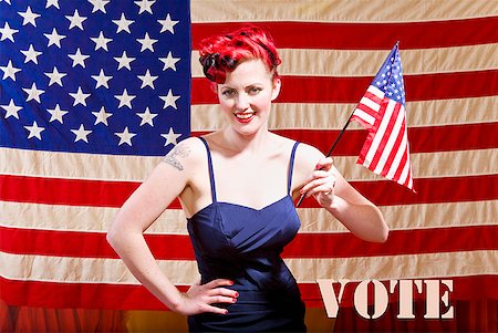 pin up - Woman in front of American flag Stock Photo - Premium Royalty-Free, Code: 673-02143635