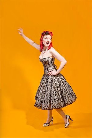 retro pin up girls - Woman wearing strapless evening gown Stock Photo - Premium Royalty-Free, Code: 673-02143749