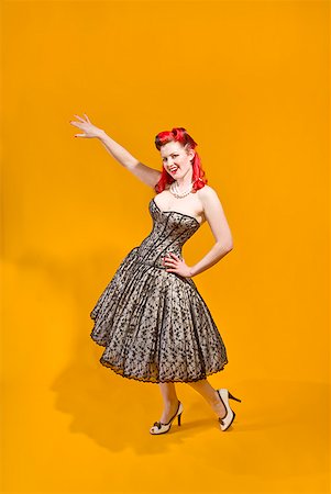 retro pin up girls - Woman wearing strapless evening gown Stock Photo - Premium Royalty-Free, Code: 673-02143750