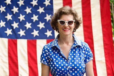 simsearch:673-02143767,k - Patriotic woman posing with American flag Stock Photo - Premium Royalty-Free, Code: 673-02216545