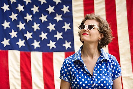 simsearch:673-02143767,k - Patriotic woman posing with American flag Stock Photo - Premium Royalty-Free, Code: 673-02216546