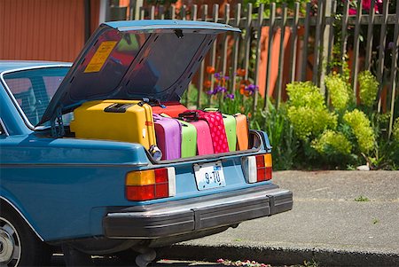 funny luggage - Car trunk loaded with colorful suitcases Stock Photo - Premium Royalty-Free, Code: 673-02216569