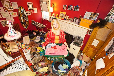 dirty look - Teen girl in messy room Stock Photo - Premium Royalty-Free, Code: 673-03005670