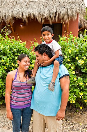 portrait of young mexican family Stock Photo - Premium Royalty-Free, Code: 673-03623226