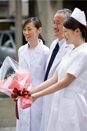 simsearch:685-02938374,k - Doctors and nurse smiling Stock Photo - Premium Royalty-Free, Code: 685-02938403