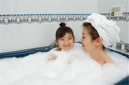 Mother and daughter taking bath Stock Photo - Premium Royalty-Free, Code: 685-02940666