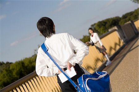 Schoolboy holding love letter Stock Photo - Premium Royalty-Free, Code: 685-02941521