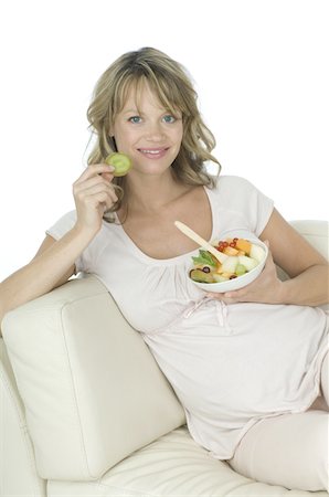 simsearch:689-03733616,k - Pregnant woman eating fruit salad Stock Photo - Premium Royalty-Free, Code: 689-05610306