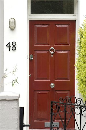 door knocker - Closed front door Stock Photo - Premium Royalty-Free, Code: 689-05610409