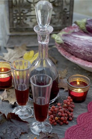 Candles, carafe and glass with red wine Stock Photo - Premium Royalty-Free, Code: 689-05610789
