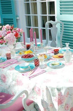 Laid table on terrace Stock Photo - Premium Royalty-Free, Code: 689-05610854