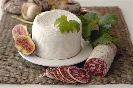 Bread, figs, feta and salami Stock Photo - Premium Royalty-Free, Code: 689-05611624