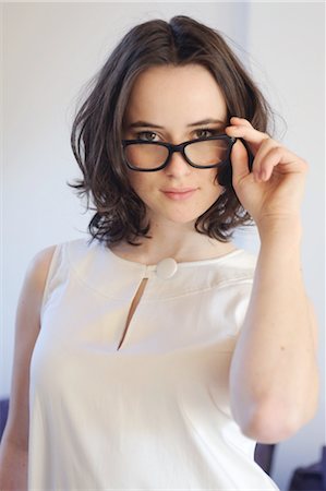 people 25 - Brunette young woman with glasses Stock Photo - Premium Royalty-Free, Code: 689-05611968