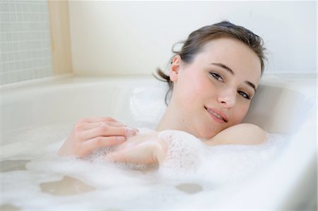 Young woman enjoying bath Stock Photo - Premium Royalty-Free, Code: 689-05611991