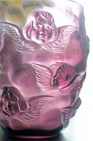 Ornate glass with angel figurines Stock Photo - Premium Royalty-Free, Code: 689-05612088