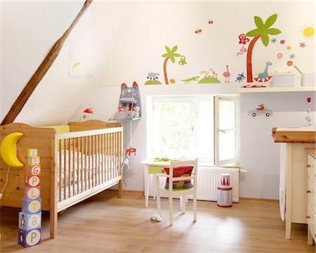 domestic room - Childrens room with crib and painted wall Stock Photo - Premium Royalty-Free, Code: 689-05612300