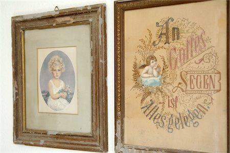past - Two antique pictures in frames at wall Stock Photo - Premium Royalty-Free, Code: 689-05612519