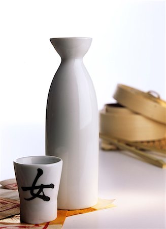sake - Japanese sake carafe with a sake cup Stock Photo - Premium Royalty-Free, Code: 689-03123937
