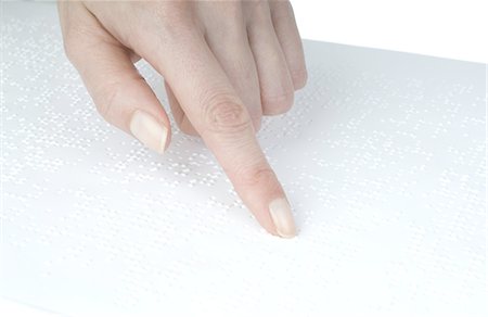 Woman reading Braille Stock Photo - Premium Royalty-Free, Code: 689-03733282