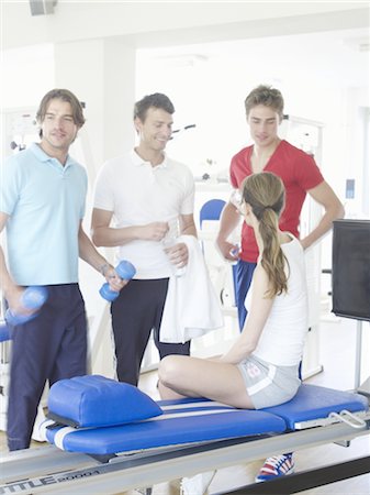 simsearch:689-03733468,k - Three men and a woman in a health club Stock Photo - Premium Royalty-Free, Code: 689-03733763