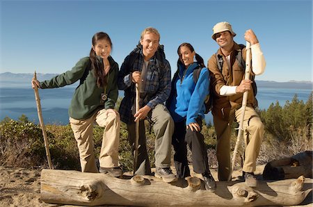 Four friends hiking at coast, (portrait) Stock Photo - Premium Royalty-Free, Code: 694-03319472