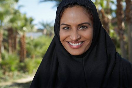 Portrait of muslim woman in black headscarf Stock Photo - Premium Royalty-Free, Code: 694-03327104