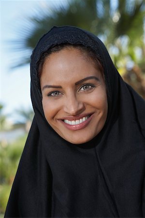 Portrait of muslim woman in black headscarf Stock Photo - Premium Royalty-Free, Code: 694-03327105