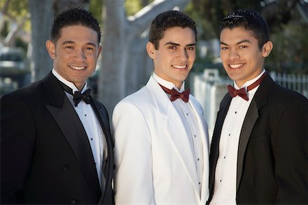 quinceanera - Portrait of three boys (13-15) wearing tuxedos at Quinceanera Stock Photo - Premium Royalty-Free, Code: 694-03327385