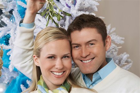 Couple under mistletoe, portrait Stock Photo - Premium Royalty-Free, Code: 694-03327522