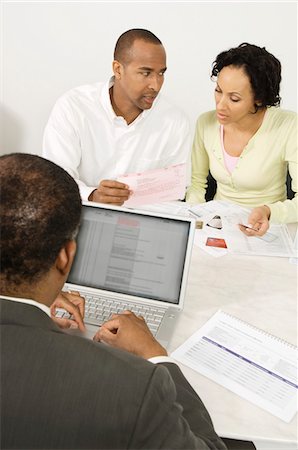 Couple Seeing Accountant Foto de stock - Sin royalties Premium, Código: 694-03329389