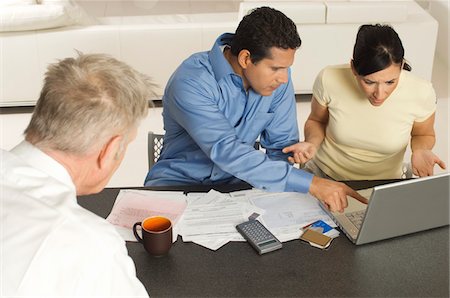 Accountant Working with Couple Foto de stock - Sin royalties Premium, Código: 694-03329437