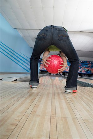 Young woman bowling, back view Stock Photo - Premium Royalty-Free, Code: 694-03320079