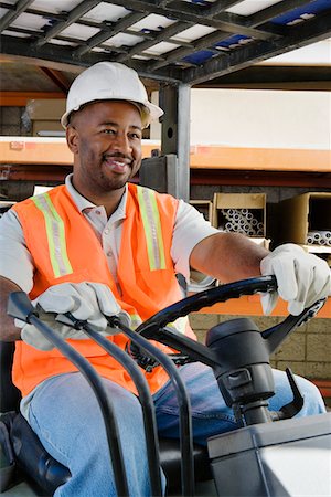 forklift - Workman Driving a Forklift Stock Photo - Premium Royalty-Free, Code: 694-03330290