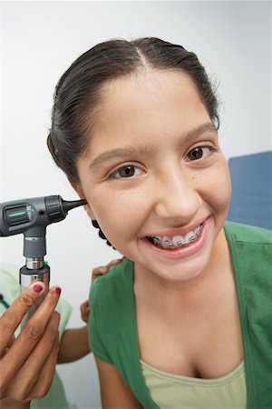 Girl having medical examination Stock Photo - Premium Royalty-Free, Code: 694-03331605