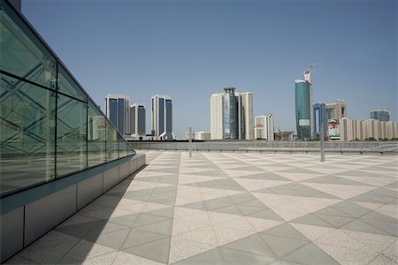 plaza - Dubai, UAE, Architectural detail of Emirates Towers plaza and surrounding buildings Stock Photo - Premium Royalty-Free, Code: 694-03331863