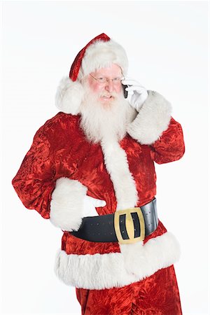 santa claus - Santa Claus on mobile phone Stock Photo - Premium Royalty-Free, Code: 694-03332467