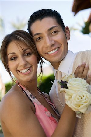 Well-dressed teenage couple outside school dance, portrait Stock Photo - Premium Royalty-Free, Code: 694-03692596