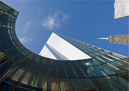 Gratte-ciel avec la réflexion des bâtiments sur la façade, angle faible, vue abstraite Photographie de stock - Premium Libres de Droits, Code: 695-05764056