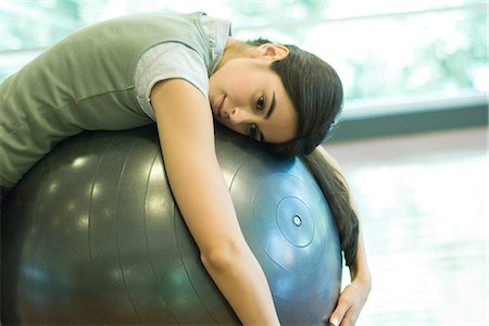simsearch:695-05768377,k - Young woman resting on fitness ball Stock Photo - Premium Royalty-Free, Code: 695-05765276