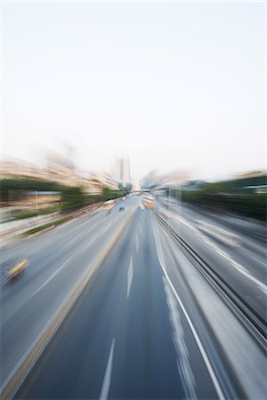 panning (camera technique) - City thoroughfare, blurred motion Stock Photo - Premium Royalty-Free, Code: 695-05767347