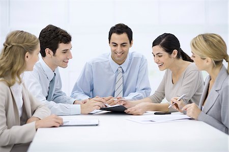 southern - Group of professionals sitting at table, discussing document Stock Photo - Premium Royalty-Free, Code: 695-05769078