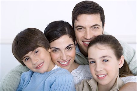 simsearch:695-05769087,k - Portrait of family with two children, close-up Stock Photo - Premium Royalty-Free, Code: 695-05769084