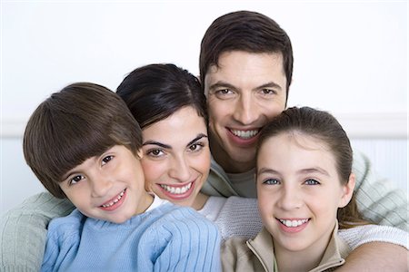 simsearch:695-05769087,k - Portrait of family with two children, close-up Stock Photo - Premium Royalty-Free, Code: 695-05769085