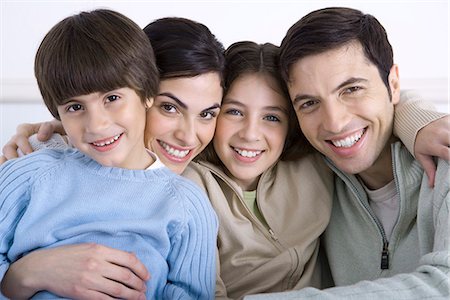 simsearch:695-05769087,k - Portrait of family with two children, close-up Stock Photo - Premium Royalty-Free, Code: 695-05769082