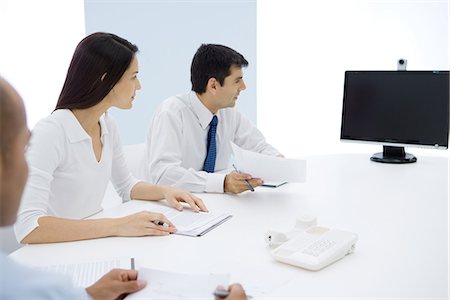 Group of executives having teleconference Stock Photo - Premium Royalty-Free, Code: 695-05769187