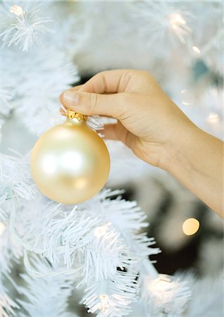 simsearch:614-02241057,k - Child putting ornament on christmas tree Stock Photo - Premium Royalty-Free, Code: 695-05763167