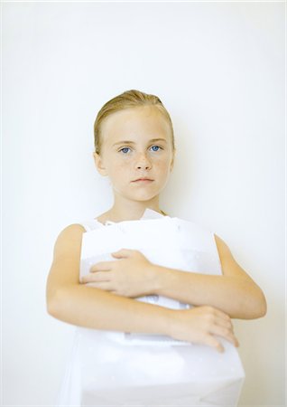 sad girls - Girl holding bag Stock Photo - Premium Royalty-Free, Code: 695-05763207