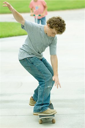 Boy on skateboard Stock Photo - Premium Royalty-Free, Code: 695-05763527