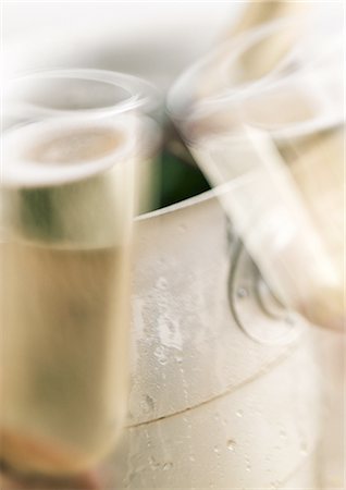 Champagne glasses being clinked Stock Photo - Premium Royalty-Free, Code: 695-05774847