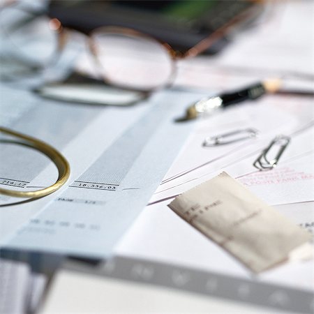 Paperwork, glasses and office materials lying on desk Stock Photo - Premium Royalty-Free, Code: 695-05776576